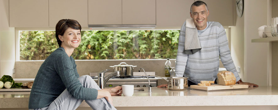 family in granite kitchen